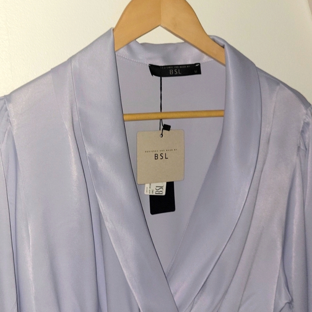 BSL brand gray romper. Size M. New with tags.